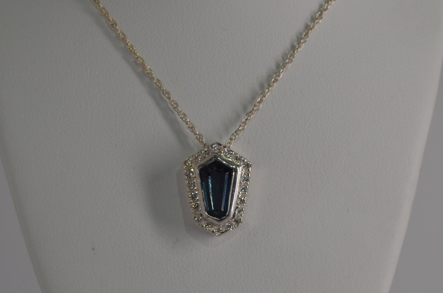Blue Topaz And Diamond Pendant