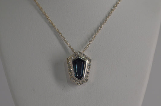 Blue Topaz And Diamond Pendant