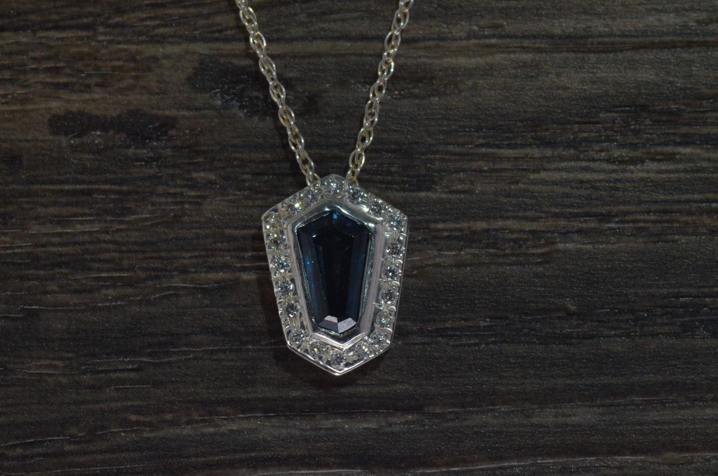 Blue Topaz And Diamond Pendant