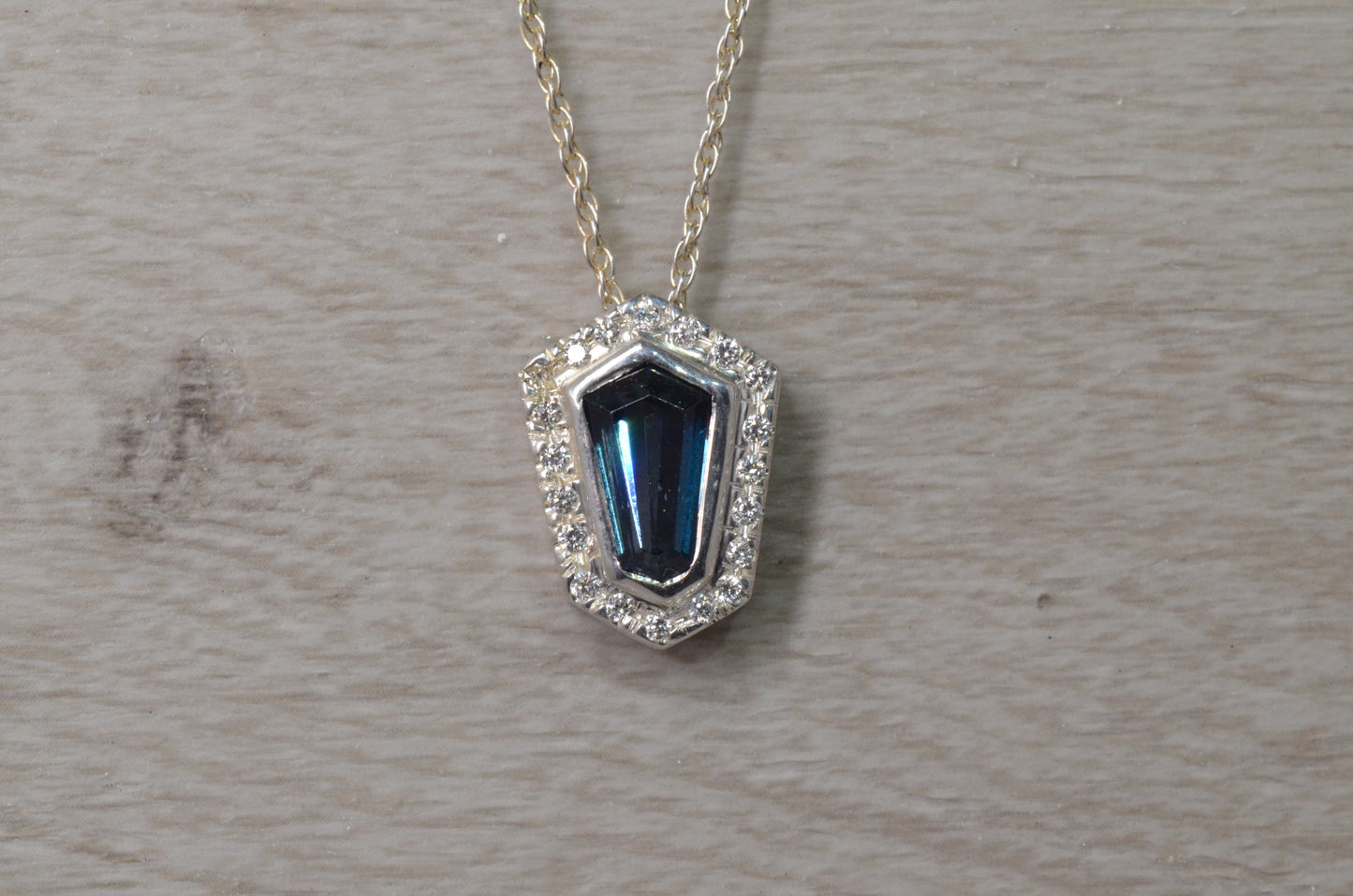 Blue Topaz And Diamond Pendant