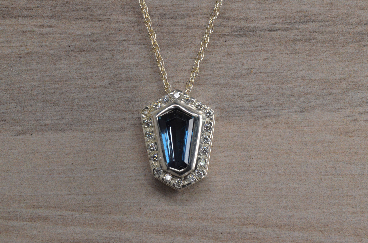Blue Topaz And Diamond Pendant